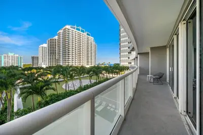 a balcony with a view of a city at W FT LAUDERDALE RESIDENCES BY IMD MIAMI Stunning 2BR/2BA Unit in Fort Lauderdale
