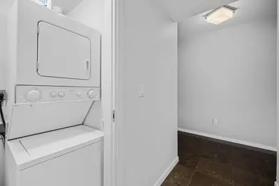 a white refrigerator with a mirror in a room at BOULAN HOTEL MIAMI BEACH BY IMD MIAMI 1BR/1BA UNIT in Miami Beach