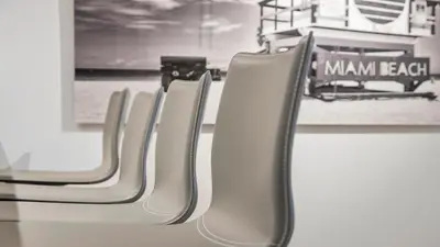 a row of empty seats on a train at 2B Ocean View Private Residence at South Beach - 804 in Miami Beach
