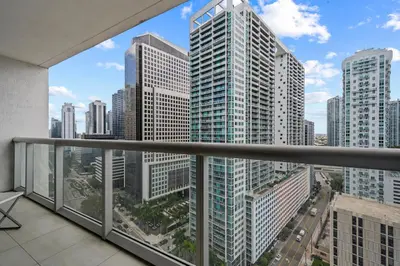 a balcony with a view of a city skyline at LOVELY 2 BR W ICON BRICKELL-WATERVIEWS -FREE SPA in Miami