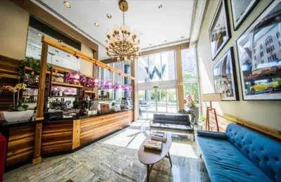 a lobby of a restaurant with a blue couch at LOVELY 2 BR W ICON BRICKELL-WATERVIEWS -FREE SPA in Miami