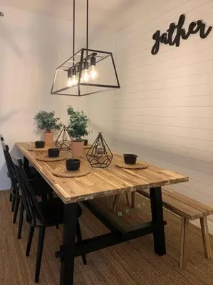 a dining room table with chairs and a light fixture at Pet-Friendly Aventura Pool, Beach, Golf, Gym in Aventura