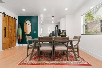 a dining room with a table and chairs at Spacious Family 3BR Near Wynwood and Beach in Miami