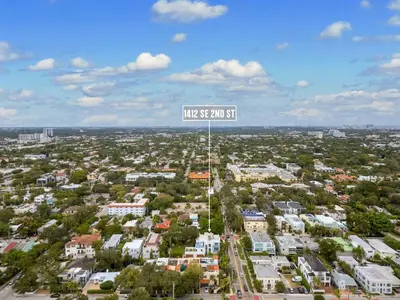 an overhead view of a city with a street sign at 4-Bed + Den with pool in Las Olas Ft Lauderdale in Fort Lauderdale