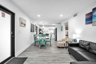 a living room with a couch and a table at West Brickell APT #1 Free Parking-Family Friendly in Miami