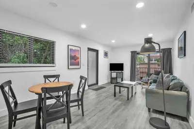 a living room with a couch and a table at West Brickell - #3 - Renovated 2 1 & Parking in Miami