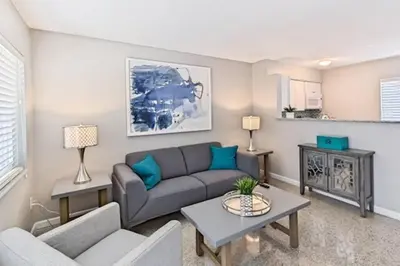 a living room with a couch and a table at WiltonPlex A in Fort Lauderdale