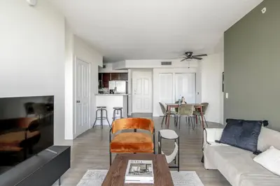 a living room with a couch and a table at Coral Gables 2br w wd pool gym near shops MIA-83 in Miami