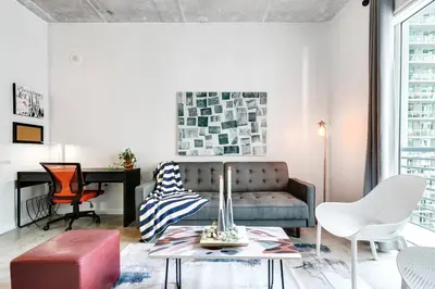 a living room with a couch and a table at Super convenient 1br apartment in Downtown 4 p 1708 in Miami