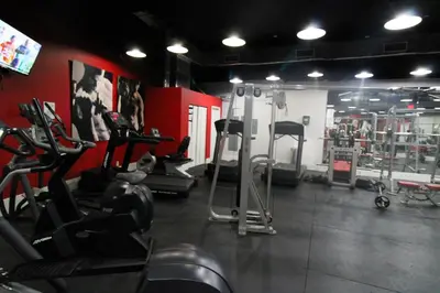 a gym with several treadmills and machines in a room at Castle 1205 Beachfront Studio with Free Parking, Beach Access, Pool, Tennis in Miami Beach