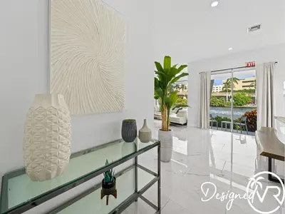 a living room with white walls and a glass table at Villa wpool spa game room in Hollywood