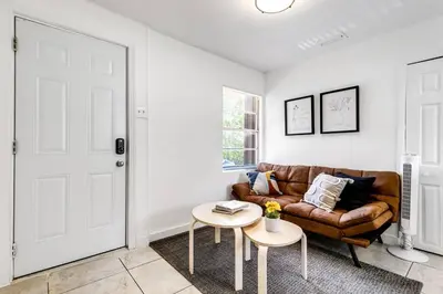 a living room with a couch and a table at Inviting 1-BR apartment for 4 people V2 in Miami