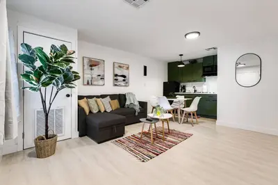 a living room with a couch and a table at Captivating 2-BR apartment for 5 people V3 in Miami