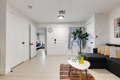 a living room with a couch and a table at Captivating 2-BR apartment for 5 people V3 in Miami