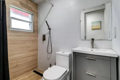 a bathroom with a toilet and a sink and a shower at Miami studio apartment, Very centric, Fast Wi-Fi V4 in Miami