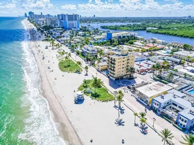 an aerial view of a beach and the ocean at Beach Front 1 Bedroom with Ocean View, Pool and Parking in Hollywood