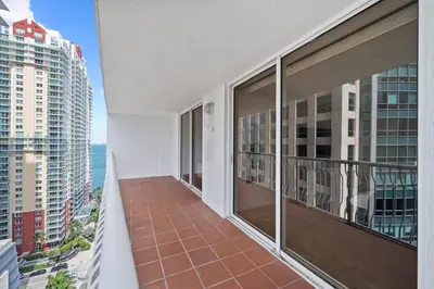 a balcony with a view of the ocean at Well Located Unit with parking - Heart Of Brickell in Miami