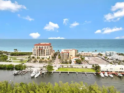 a view of a resort with boats in the water at Magical Beachfront King Escape in Hollywood