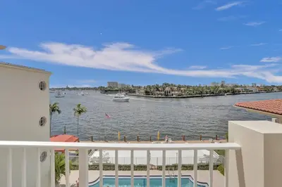 a view of the water from the balcony of a house at Fort Lauderdale Yacht & Beach Club 412 in Fort Lauderdale