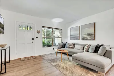 a white living room with a couch and a table at Casa Linda Gated 3 bed 2 bath by the River 1810 in Miami