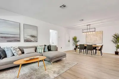 a living room with a couch and a table at Casa Linda Gated 3 bed 2 bath by the River 1810 in Miami