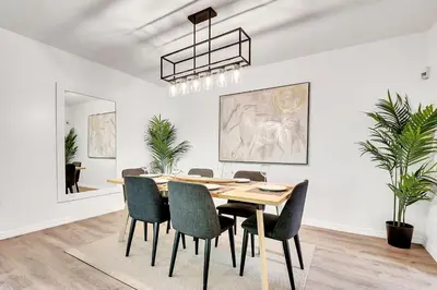 a dining room with a table and chairs at Casa Linda Gated 3 bed 2 bath by the River 1810 in Miami