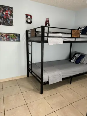 a room with two bunk beds in a room at Beds & Sheets DOWNTOWN in Miami