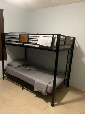 a couple of bunk beds in a room at Beds & Sheets DOWNTOWN in Miami