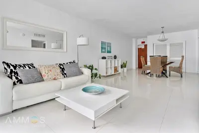 a white living room with a white couch and a table at Ocean View 1 bed Sian 11th floor Miami in Hollywood