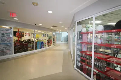 a store aisle with a lot of products at Castle Ph11 Penthouse with Balcony, Free Parking, Pool, Tennis, Beach Access in Miami Beach