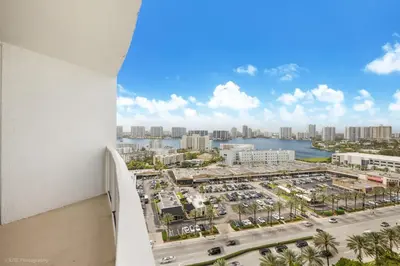 a view of the city from the balcony of a building at 5th Floor Luxury Suite at Trump Int Resort in Sunny Isles Beach
