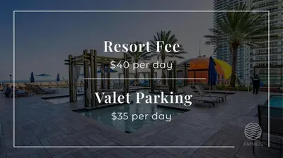 a sign for a resort fee per dayvalet parkingssper day at Beachfront Escape Pool Gym Stunning Views 30th floor in Hallandale Beach