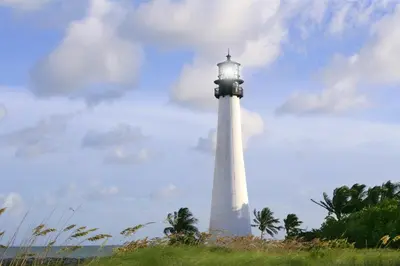 a lighthouse on a hill with a cloudy sky at Little Havana 1BR Apt w Parking in Miami