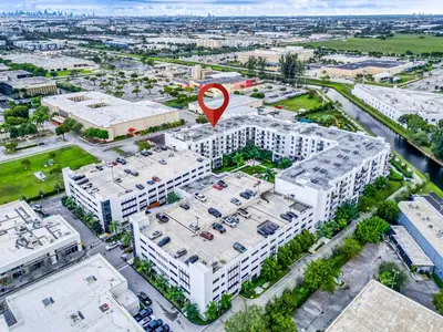 an overhead view of a building with a red marker on it at Modern 1 Bedroom In The Heart Of Downtown Doral in Hialeah Gardens