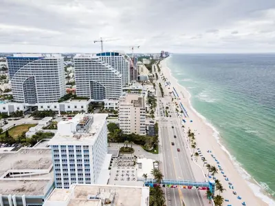 an aerial view of a beach with buildings and the ocean at Bayshore Breeze 2 in Fort Lauderdale