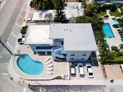 an overhead view of a building with two swimming pools at Bayshore Breeze 8 in Fort Lauderdale