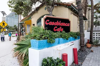a sign for a casablanca cafe on the side of a building at Bayshore Breeze 10 in Fort Lauderdale