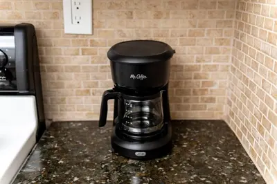 a coffee maker sitting on top of a counter at Short Walk to Wilton Drive Apt3 in Fort Lauderdale