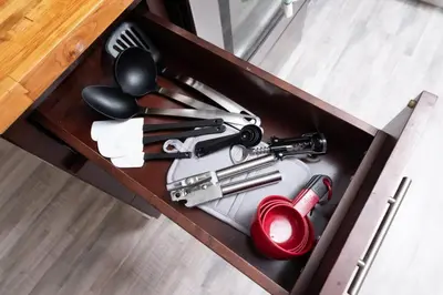a wooden box with cooking utensils in it at Just Off Wilton Drive Apt 6 in Fort Lauderdale