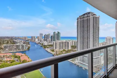 a view of a river from a balcony in a city at Amazing View - Pool - Gym - 2 Bedrooms in Hallandale Beach