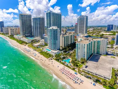 an aerial view of a beach and buildings at Hollywood on The Beach in Hollywood
