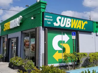 a fast food restaurant with a subway sign on it at Crocodhouse early check in eight years hosting in Fort Lauderdale