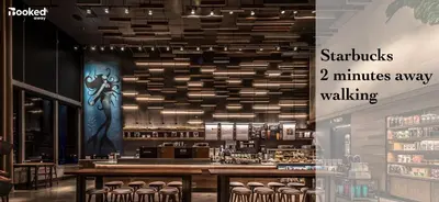 a restaurant with a bar with stools minutes away walking at High-End remodeled apartment, On the Beach in Miami Beach