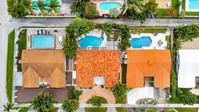 an overhead view of a house with orange roofs at Casa Azul 4Bed 2Bath Home with Heated Pool & Spa 1304 in Hollywood
