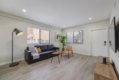 a living room with a couch and a table at Heart of Little Havana Awaits in Miami