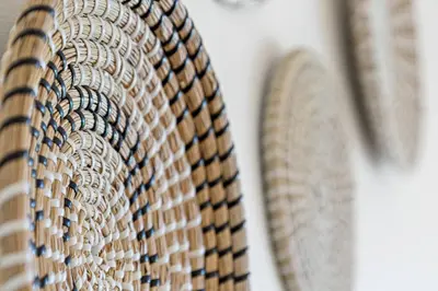 a close up of a wicker basket on a wall at Beach Apt with Waterview in Las Olas Blvd in Fort Lauderdale