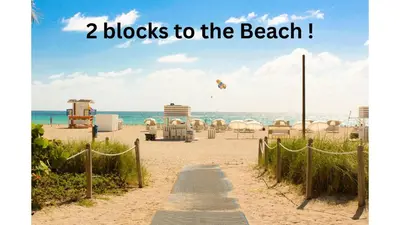 a beach with the words blocks to the beach at Best location by the Beach ! Free WiFi - TV - All amenities 103 in Miami Beach