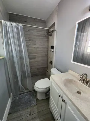 a bathroom with a toilet and a shower and a sink at The Perfect Vacation Getaway ! in Miami