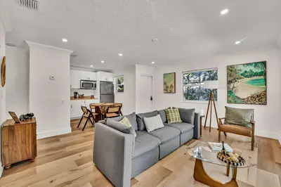 a living room with a couch and a table at Beautiful 2 BR Apartment - Bright and Spacious in Fort Lauderdale