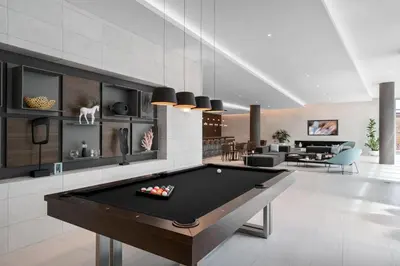 a living room with a pool table in it at 3900-719JC DESIGN DISTRICT, CONDO 1 BEDROOM /1 BATHROOM & BAYVIE in Miami